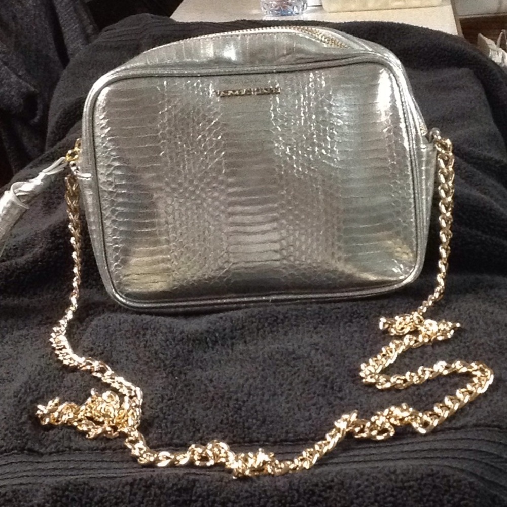 Silver VICTOTIA SECRET cross body purse